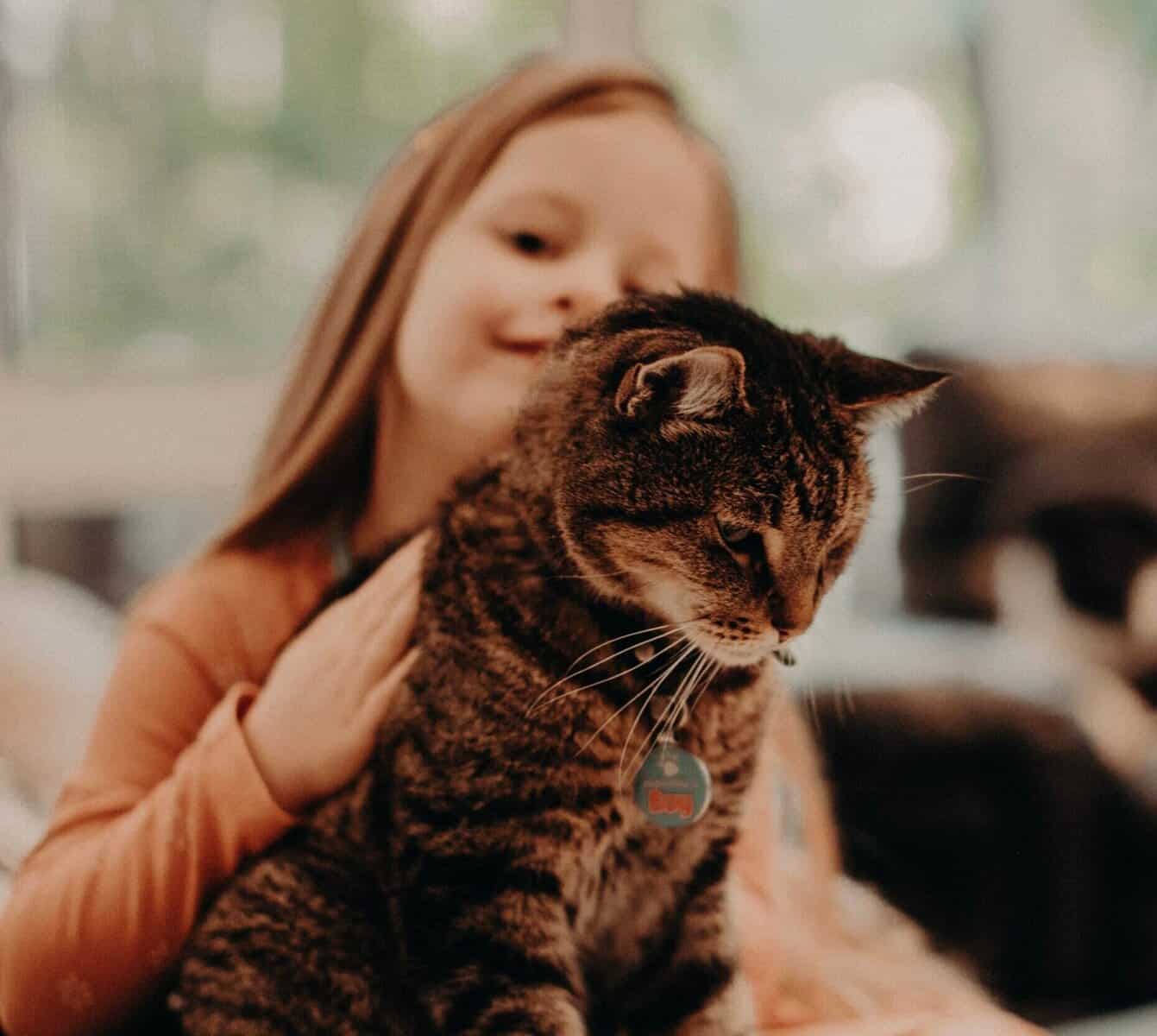 Abby and cat Spade for best pets for kids and the important role of animals in child development